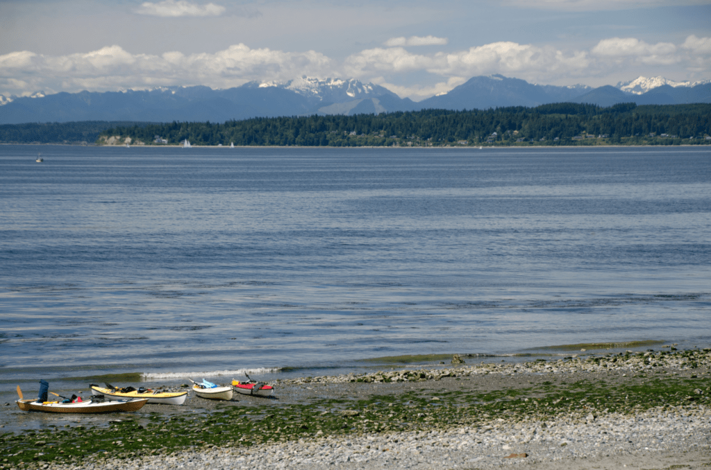 View of the Cascade mountain range over Lake Washington in Shoreline, Washington.