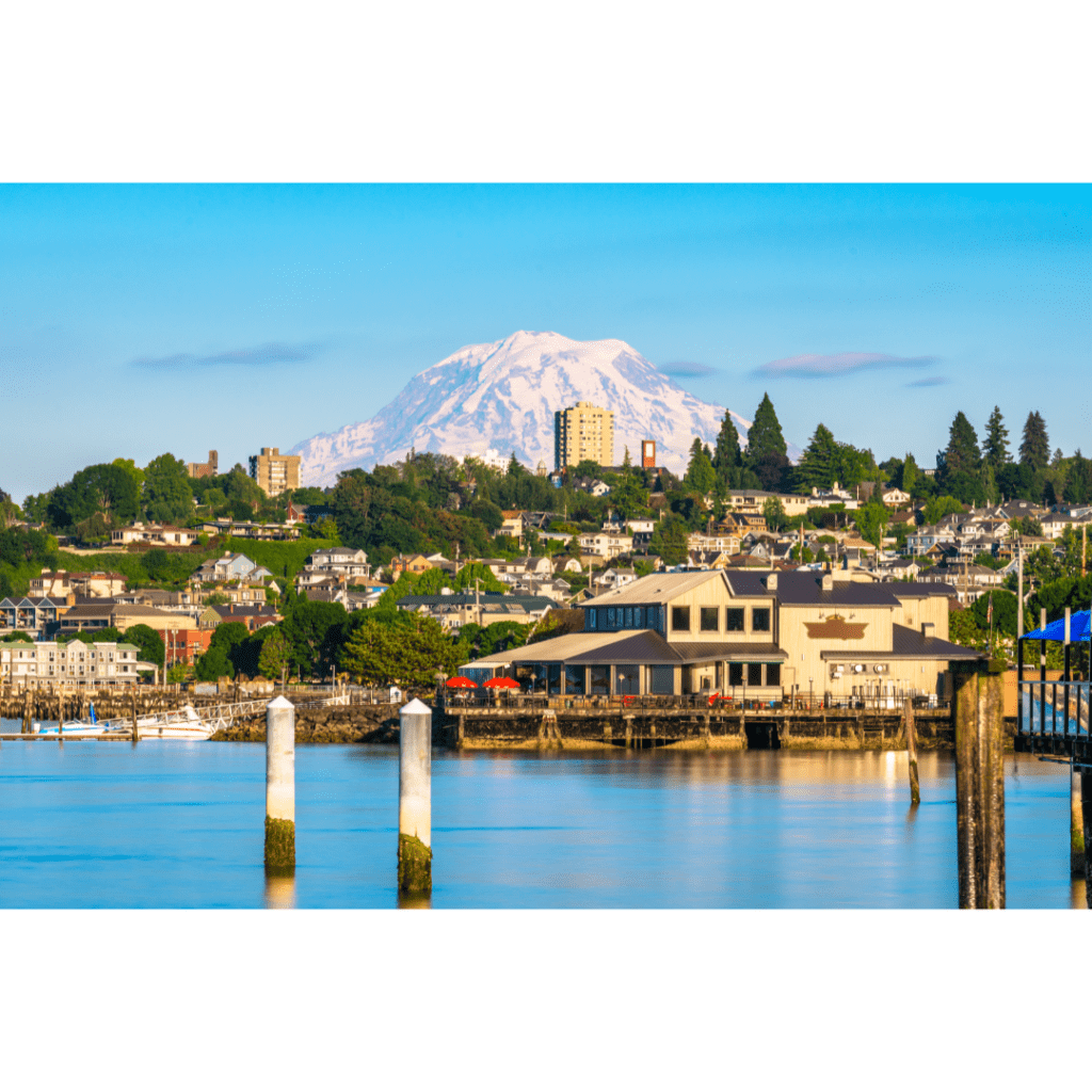 A view of Mount Rainier behind a harbor in Tacoma, Washington.